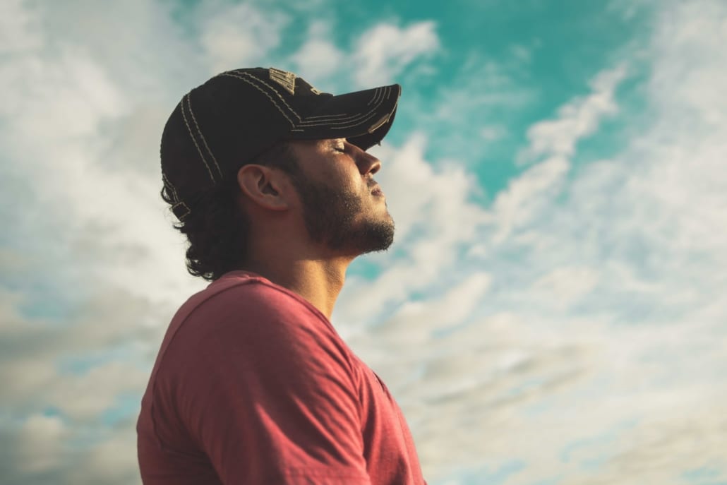 man practices meditation